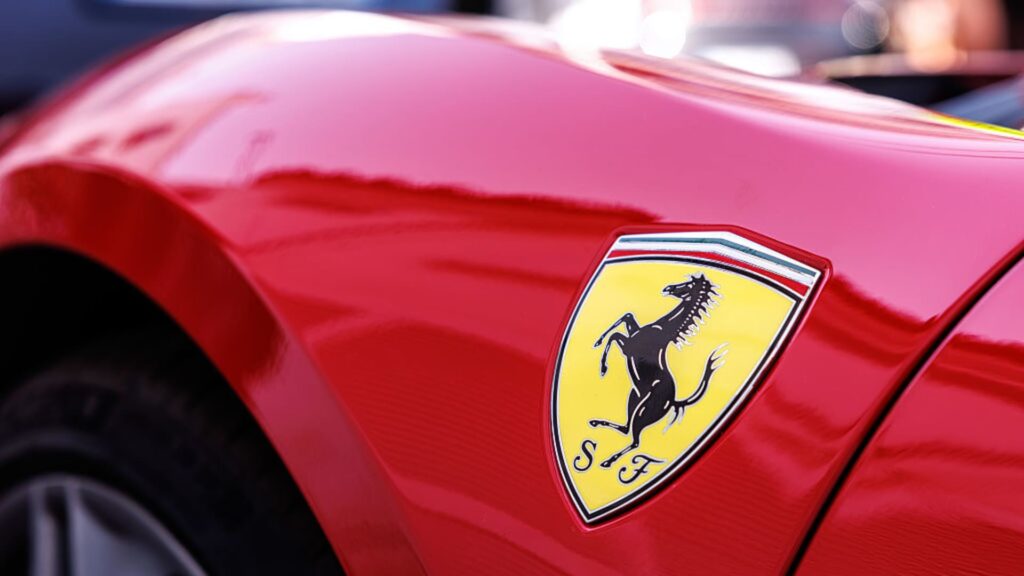 Ferrari unveils first electric vehicle and cuts 2030 EV sales target Ferrari unveils first electric vehicle and cuts 2030 EV sales target
